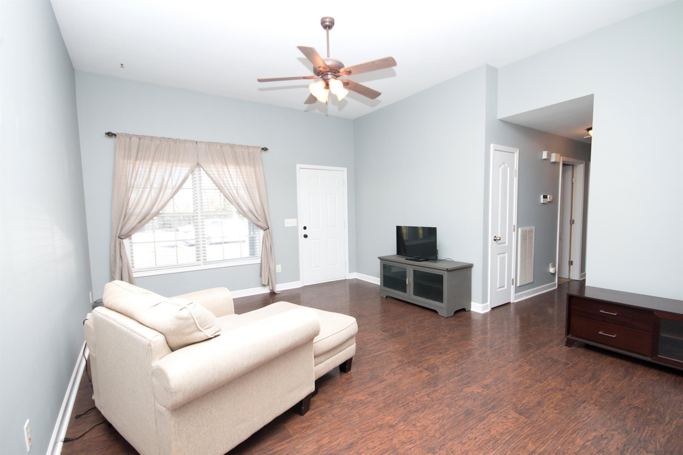 560 Rothwood Avenue Madison, TN 37115 - Photo 6 of 28 a living room with furniture and a large window