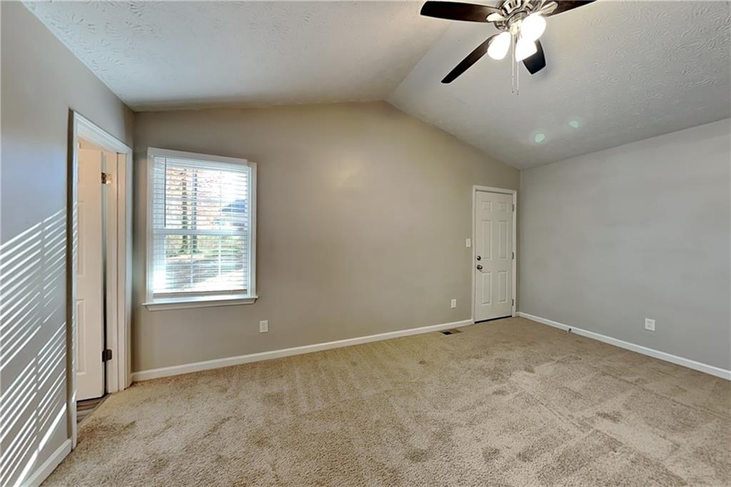 40 Arbor Way Dallas, GA 30157 - Photo 9 of 22 a view of an empty room with a window
