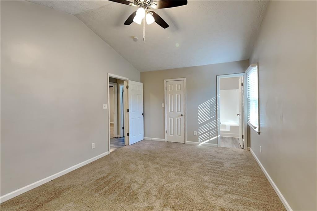 40 Arbor Way Dallas, GA 30157 - Photo 10 of 22 a view of a livingroom with a ceiling fan
