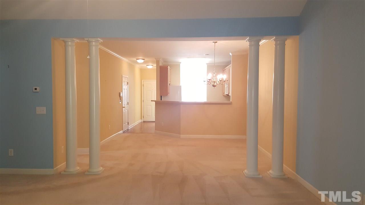2513 Forest Shadows Lane Raleigh, NC 27614 - Photo 12 of 24 a view of a bathroom with a glass shower door