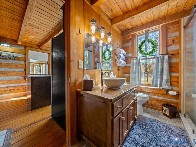 a bedroom with furniture and a bed