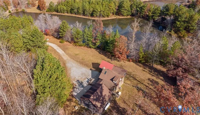 a house with swimming pool in front of it
