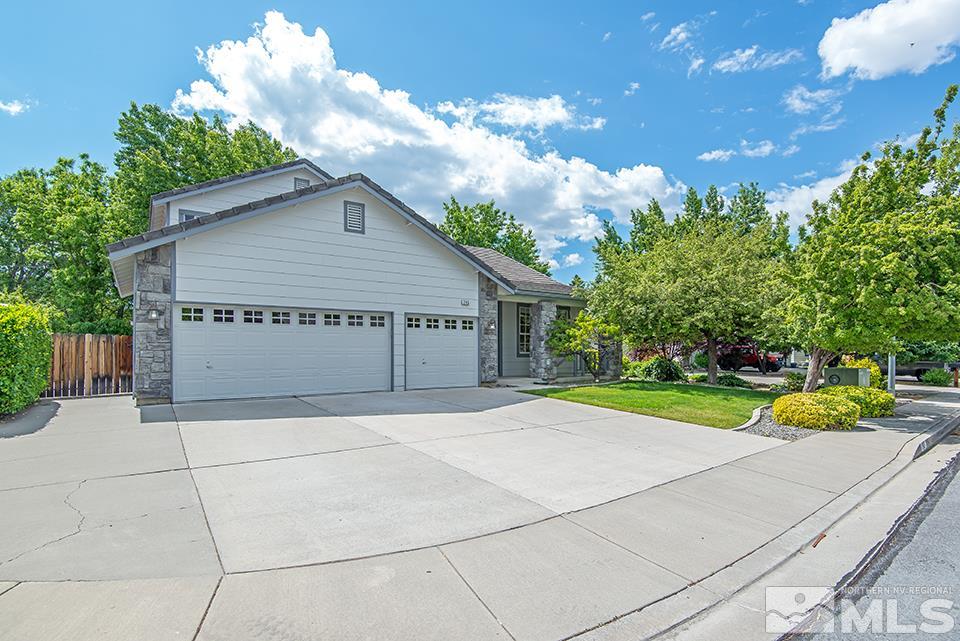 245 Falling Water Court Reno, NV 89519 - Photo 1 of 20 a view of garage with a patio