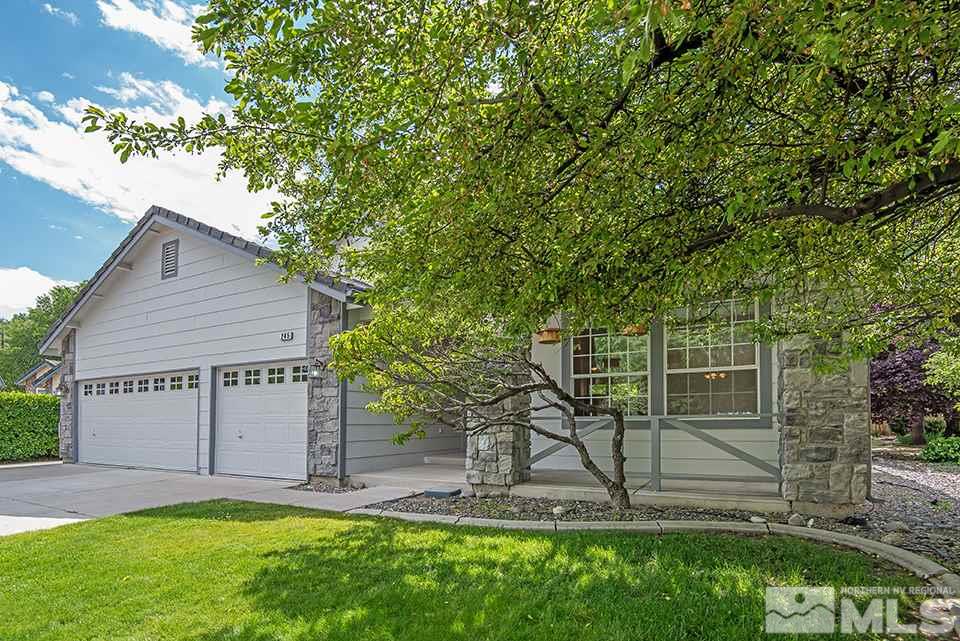 245 Falling Water Court Reno, NV 89519 - Photo 2 of 20 a view of a house with a yard and a large tree