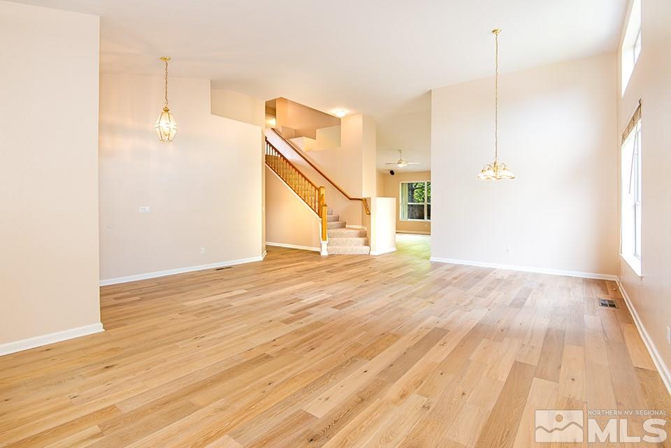 245 Falling Water Court Reno, NV 89519 - Photo 3 of 20 a view of a room with wooden floor