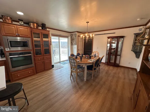a kitchen with a stove and a microwave
