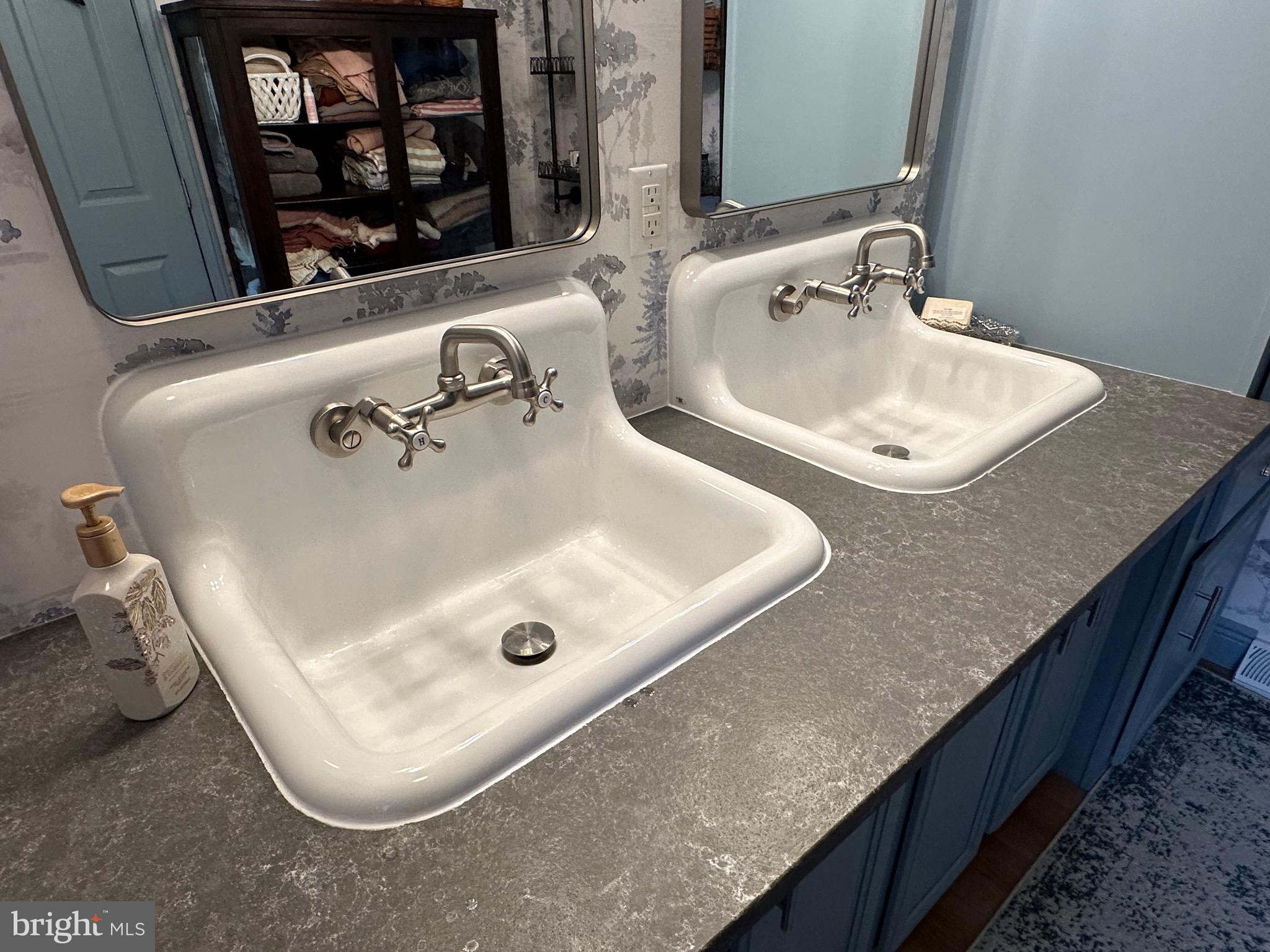 3402 Elk Lick Road Everett, PA 15537 - Photo 27 of 80 a bathroom with a granite countertop sink and a mirror