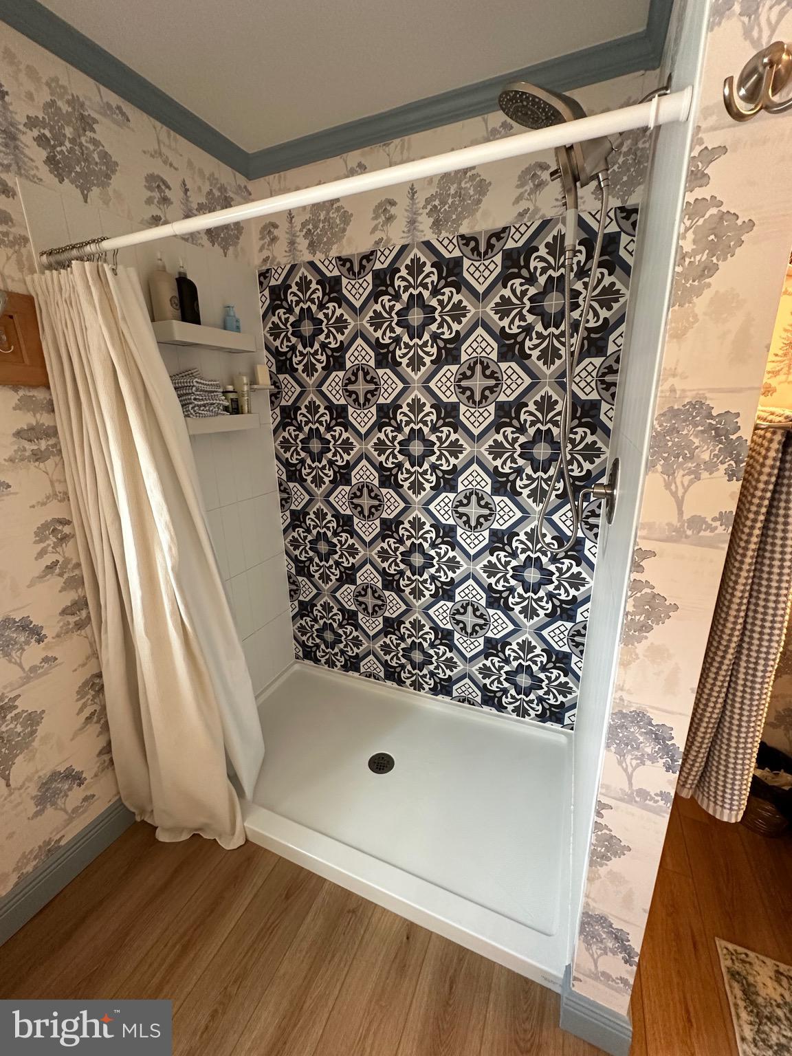 3402 Elk Lick Road Everett, PA 15537 - Photo 30 of 80 a bathroom with a bathtub and shower