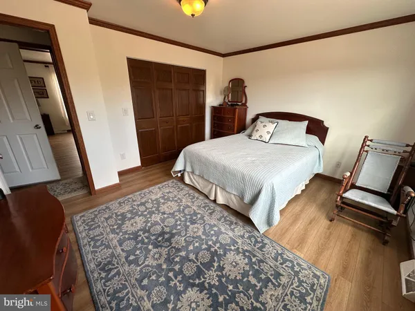 a bed room with a bed and a store