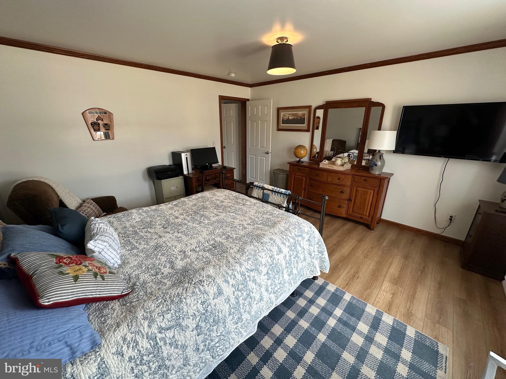 3402 Elk Lick Road Everett, PA 15537 - Photo 37 of 80 a bed room with a bed and a television