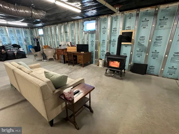 a view of a house with a snow on the road
