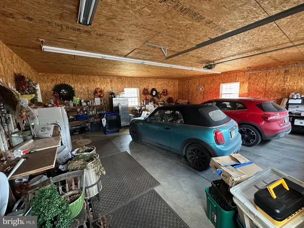 a view of a wooden house with a yard