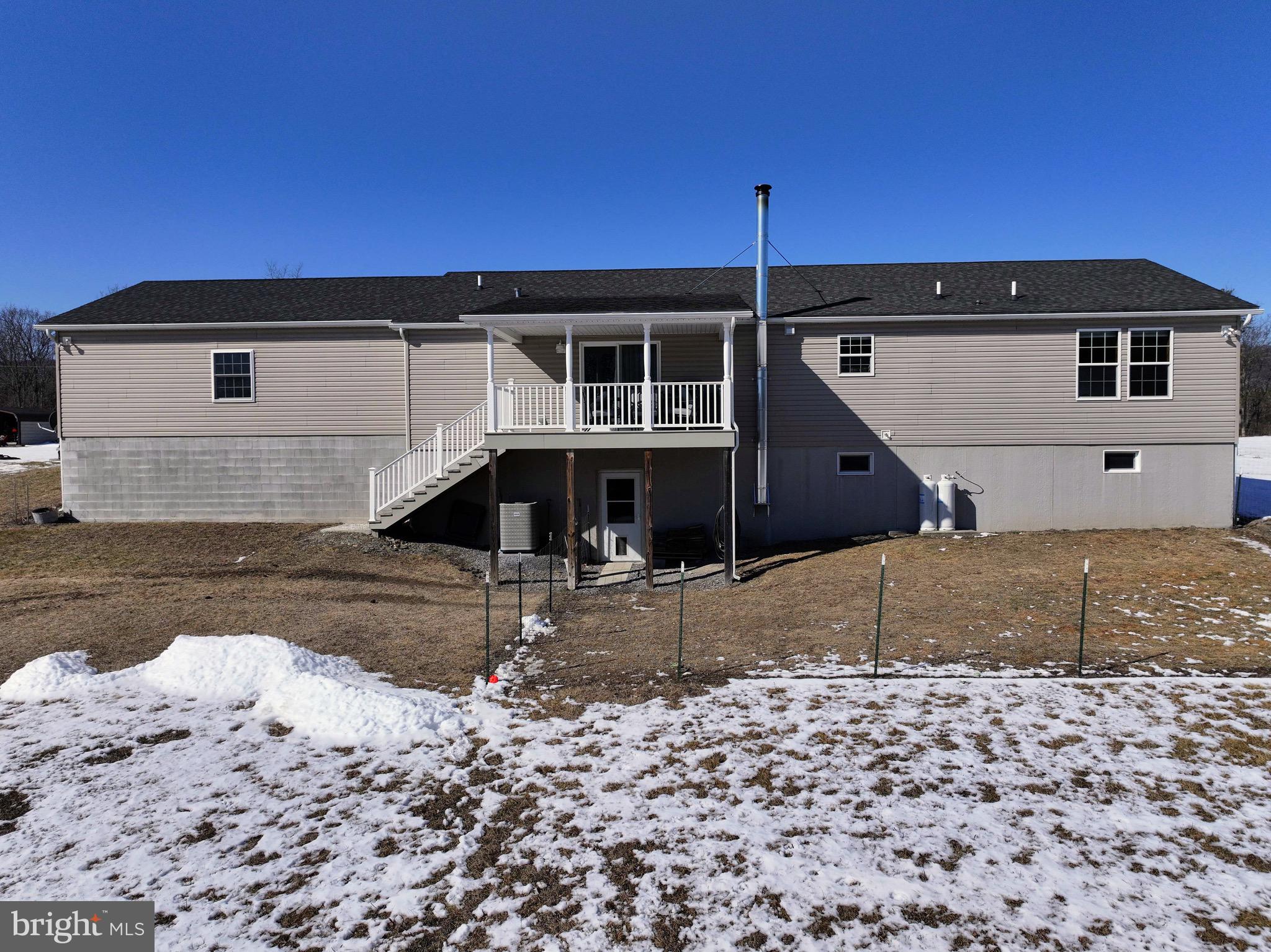 3402 Elk Lick Road Everett, PA 15537 - Photo 55 of 80 a front view of a house with a yard