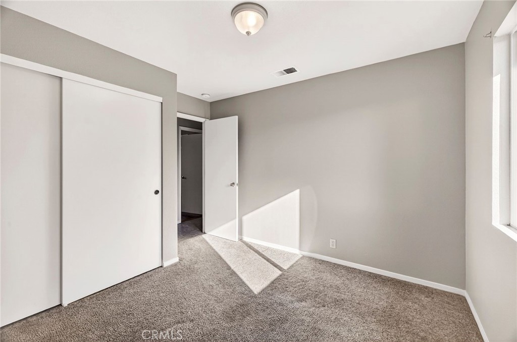2883 5th Street Biggs, CA 95917 - Photo 21 of 38 an empty room with an entryway