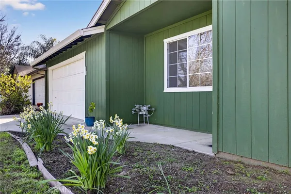 a house with a flower garden