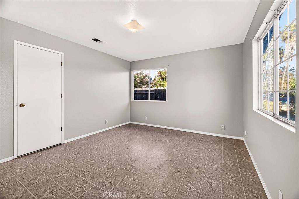 2883 5th Street Biggs, CA 95917 - Photo 8 of 38 an empty room with windows