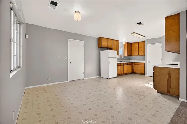 a view of a kitchen with a sink
