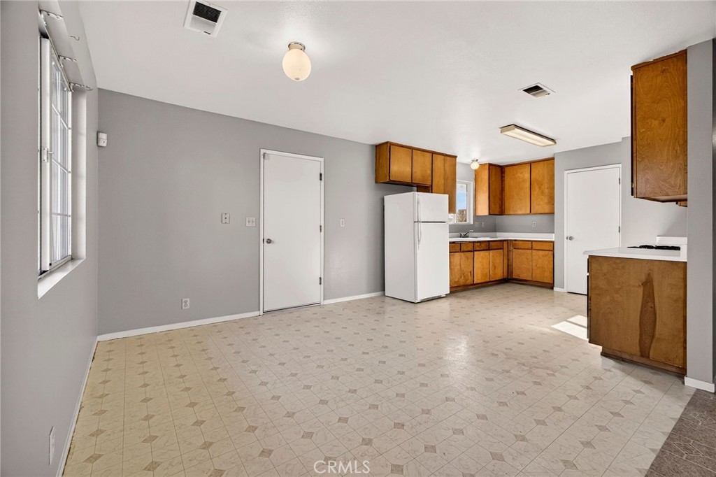 2883 5th Street Biggs, CA 95917 - Photo 10 of 38 a view of a kitchen with a sink