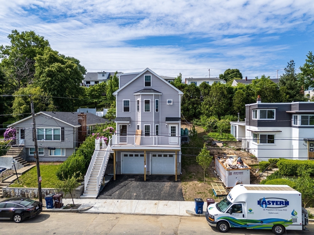 216 Vane Street, Unit 2 Revere, MA 02151 - Photo 21 of 22 an aerial view of a house with a garden and plants