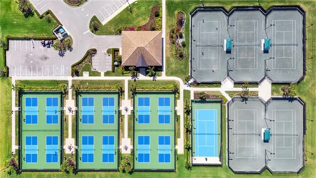 an aerial view of a house with a ocean view