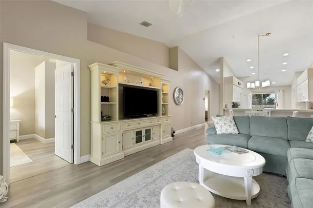 a bathroom with a double vanity sink mirror and shower