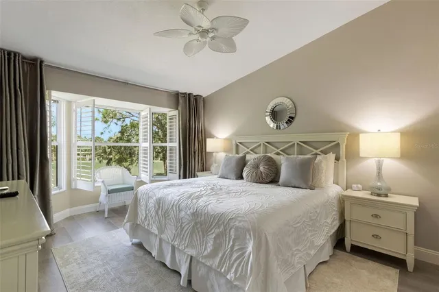 a view of a pathway along with potted plants