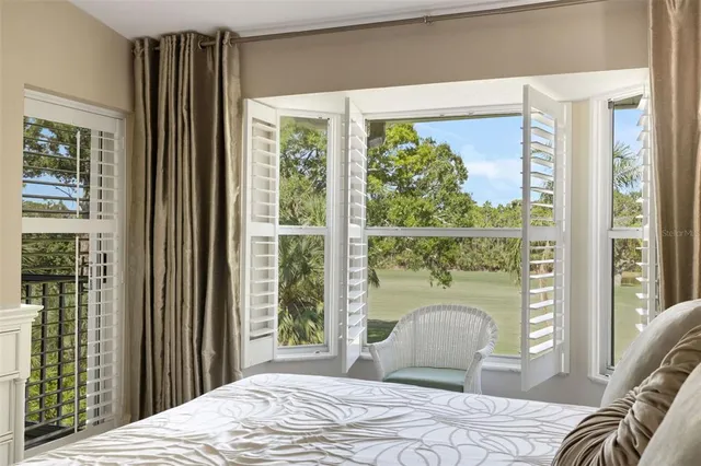 an aerial view of a house with a yard and garden