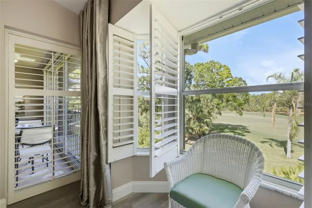 an aerial view of a city with lots of residential buildings lake and ocean view