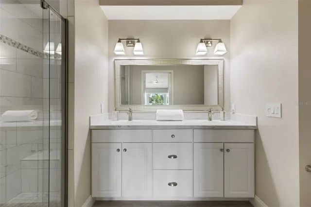 a view of a swimming pool with a patio and a yard