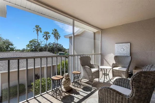 a view of a golf course with a lake view
