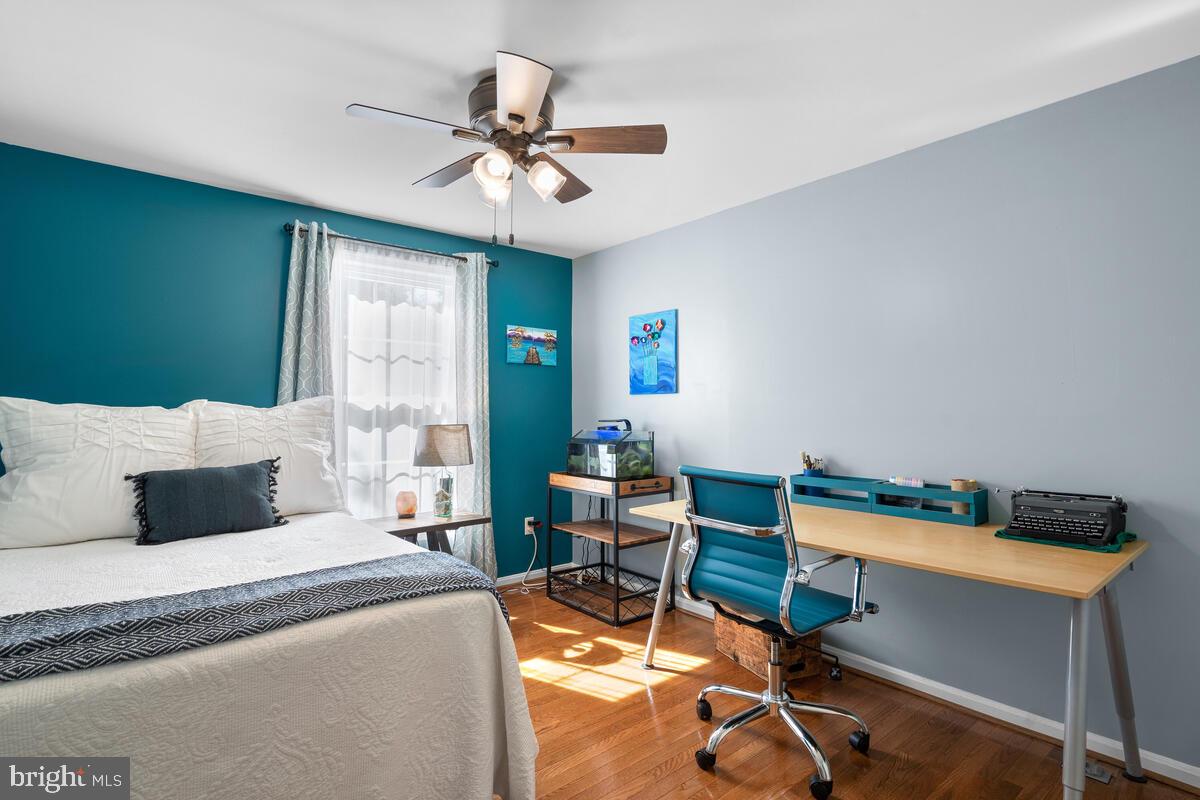 609 Sonata Way Silver Spring, MD 20901 - Photo 26 of 47 2nd bedroom with ceiling fan and hardwood floors