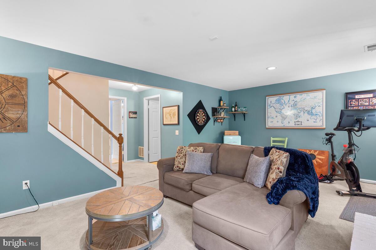 609 Sonata Way Silver Spring, MD 20901 - Photo 33 of 47 Family room with wall to wall carpet