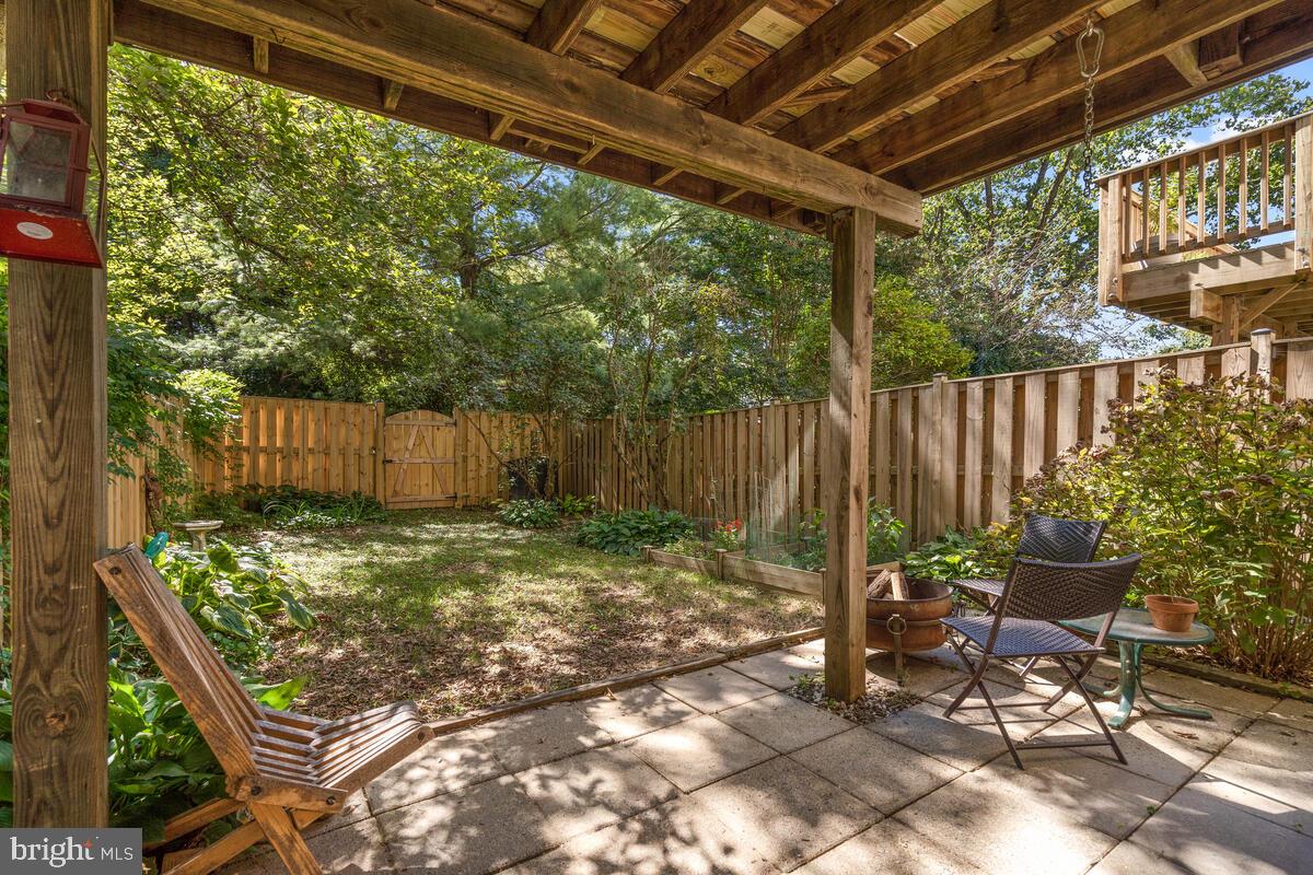 609 Sonata Way Silver Spring, MD 20901 - Photo 38 of 47 Patio overlooks wood fence backyard