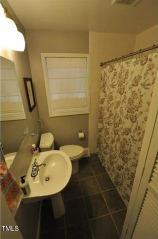 a workspace with furniture and wooden floor