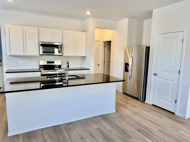 a black and white photo of a large building