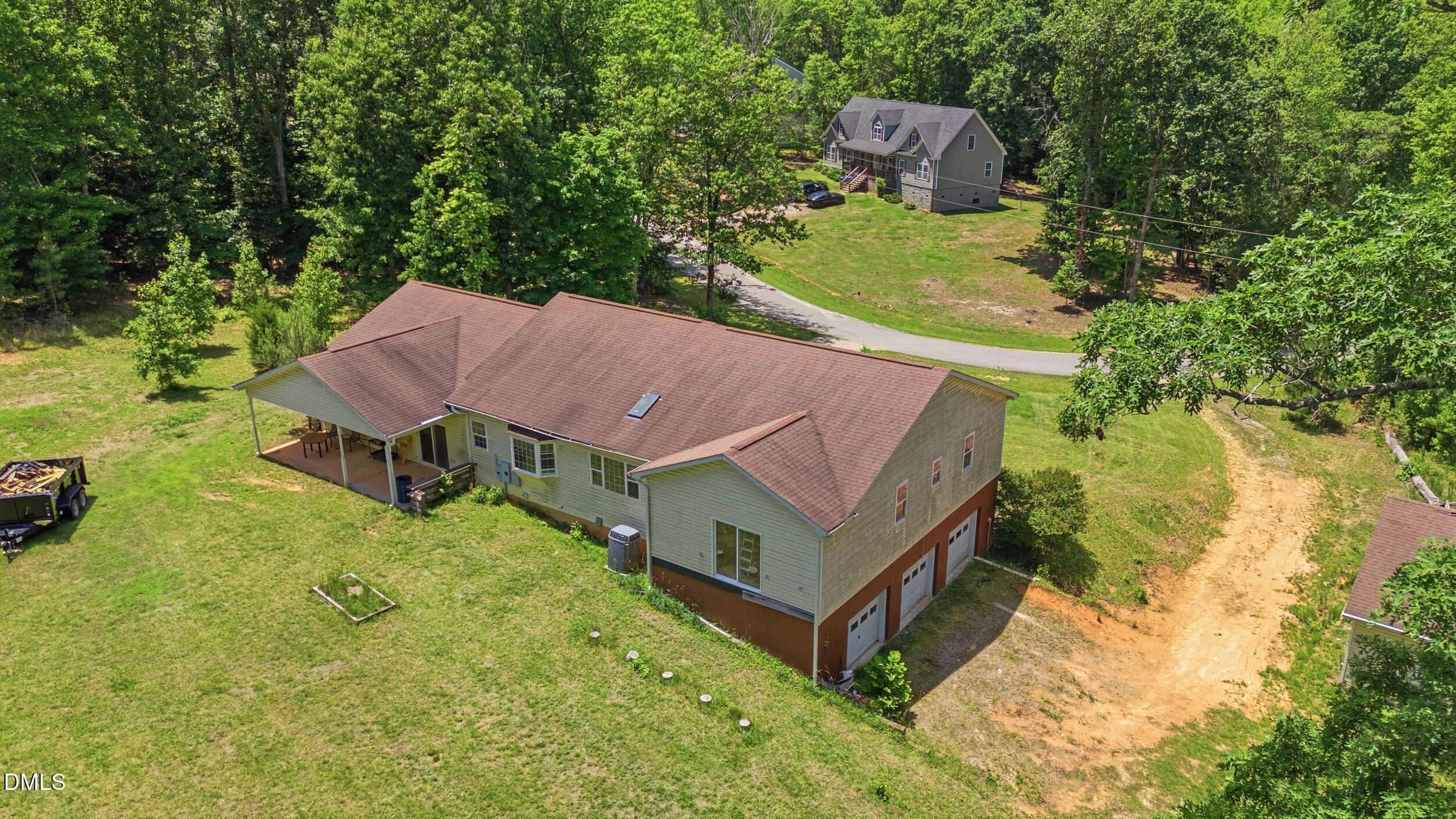 129 Shaman Drive Spring Hope, NC 27882 - Photo 31 of 43 an aerial view of a house with swimming pool and a yard