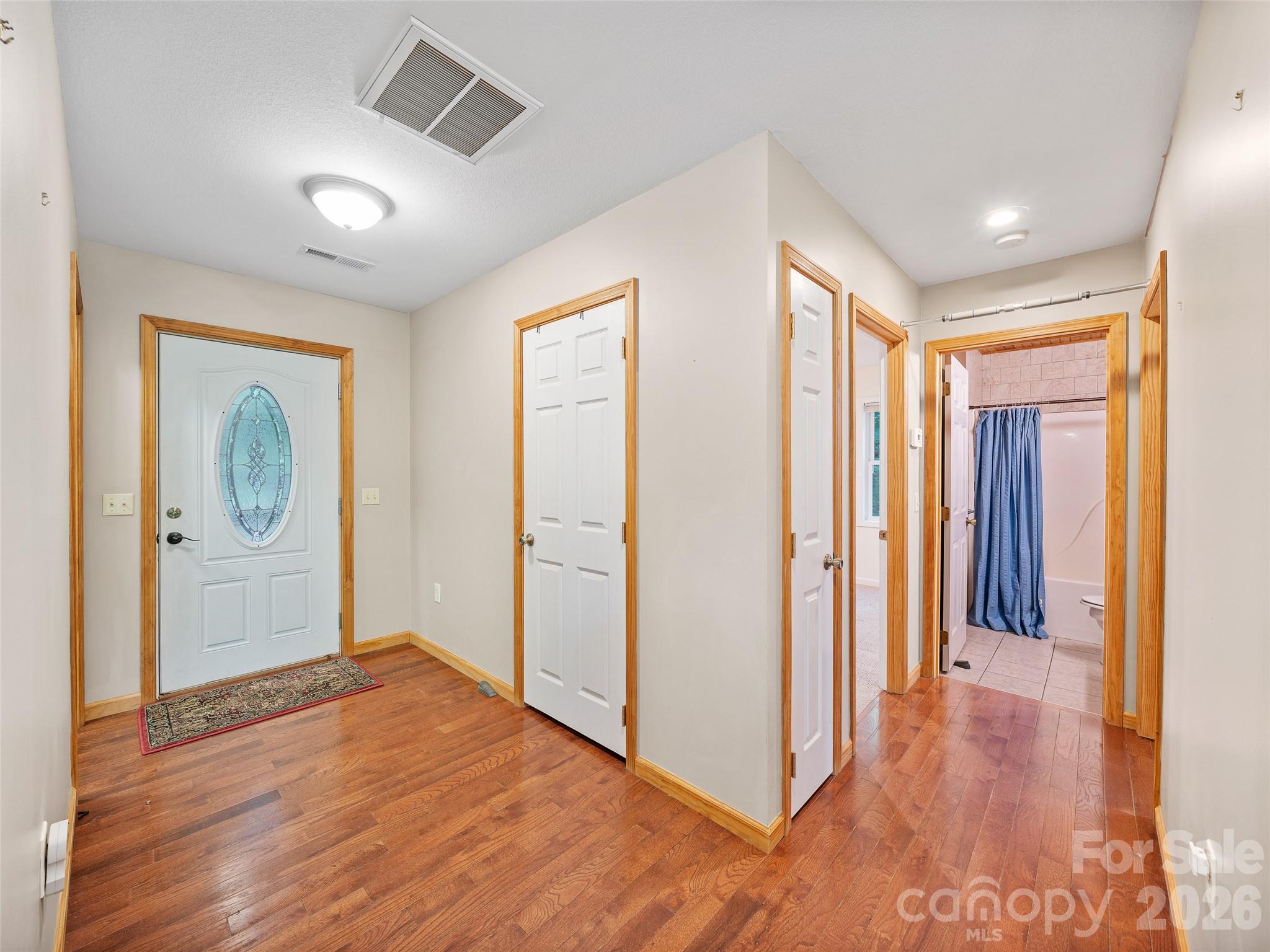 142 Wildflower Road Spruce Pine, NC 28777 - Photo 20 of 46 a view of a hallway with wooden floor