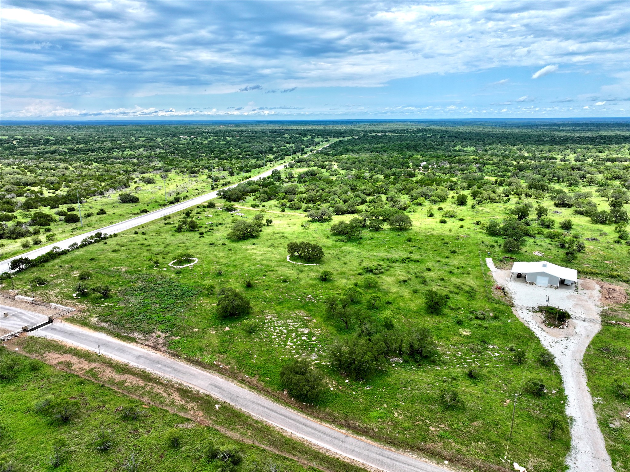 209 Rocky Holw Road San Saba, TX 76877 - Photo 6 of 8 Drone / aerial view of a forest