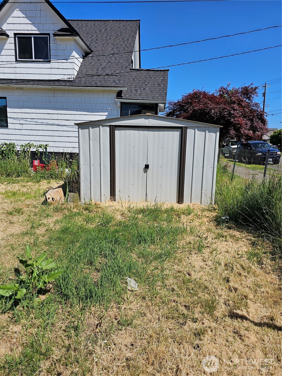 709 Monroe Street Hoquiam, WA 98550 - Photo 22 of 22 a front view of a house with a yard