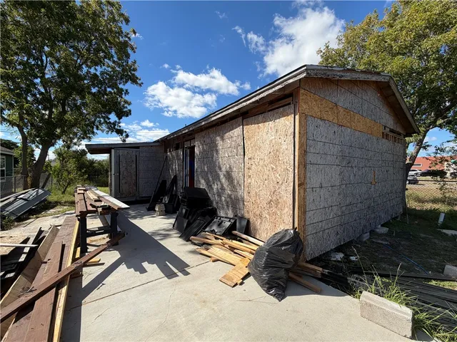 a view of backyard with hardwood
