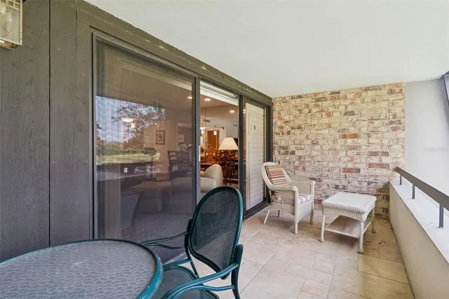 a bedroom with a bed and a flat tv screen in it