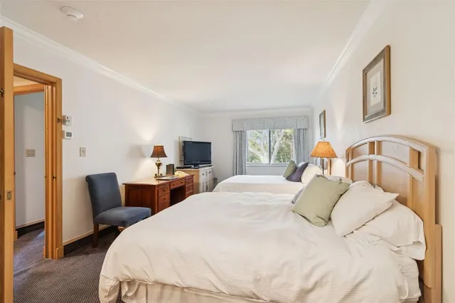 a view of a chairs and table in the patio