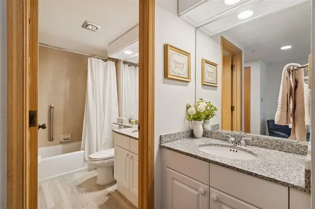 swimming pool view with a outdoor seating