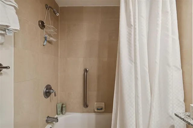 a view of a chairs and table in the patio