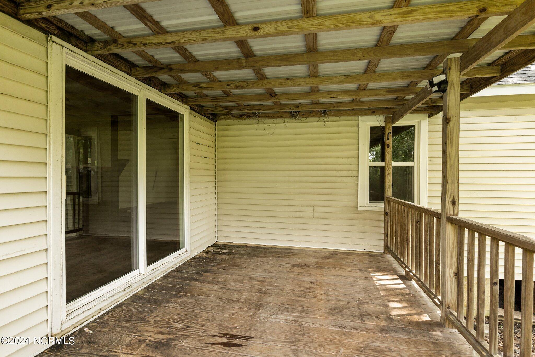 157 Airbase Road Atlantic, NC 28511 - Photo 41 of 49 Deck on the back of home and off the Dining area