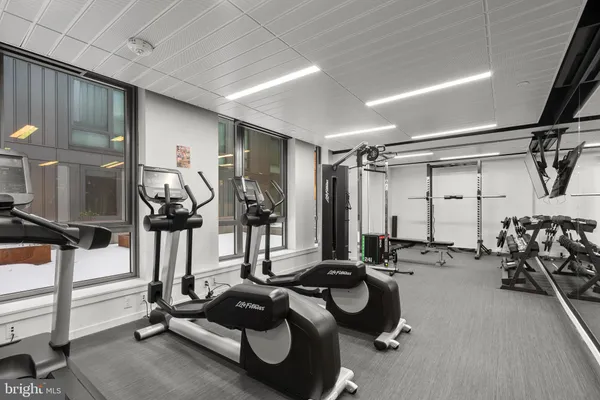 a bathroom with a tub and a sink