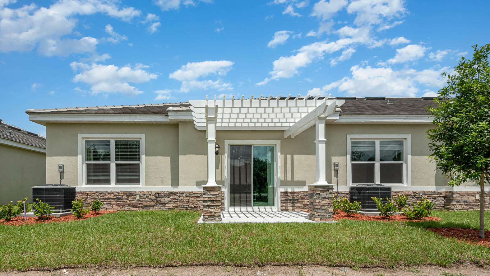 3326 Morrow Place Mims, FL 32754 - Photo 15 of 42 front view of a house with a yard