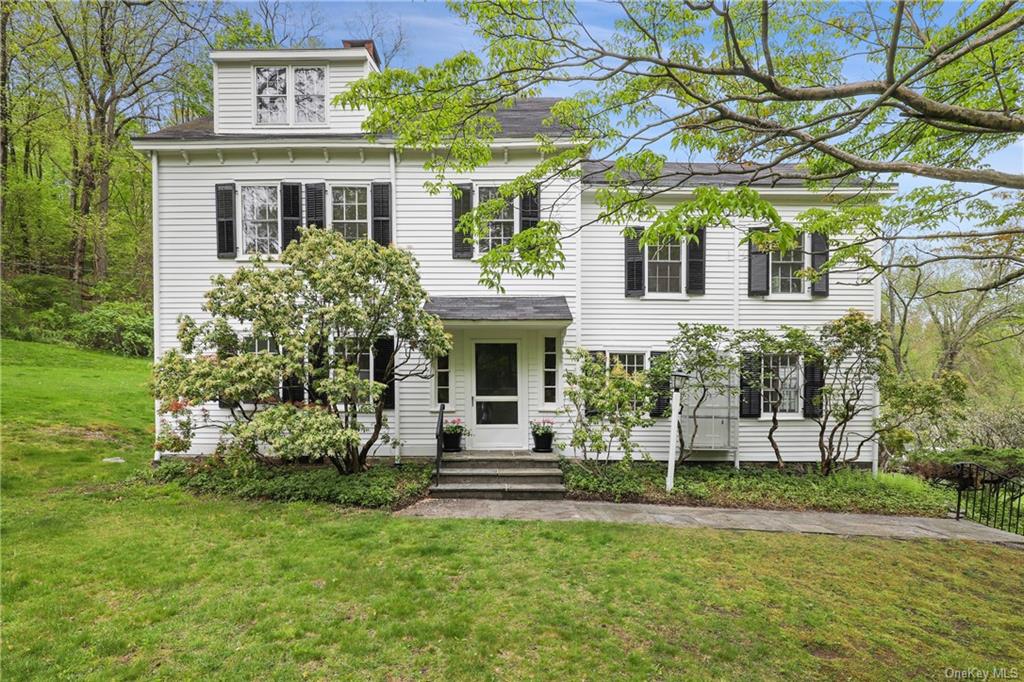 Welcome to 472 Bedford Center Road, a gracious antique colonial nestled in the heart of Bedford.