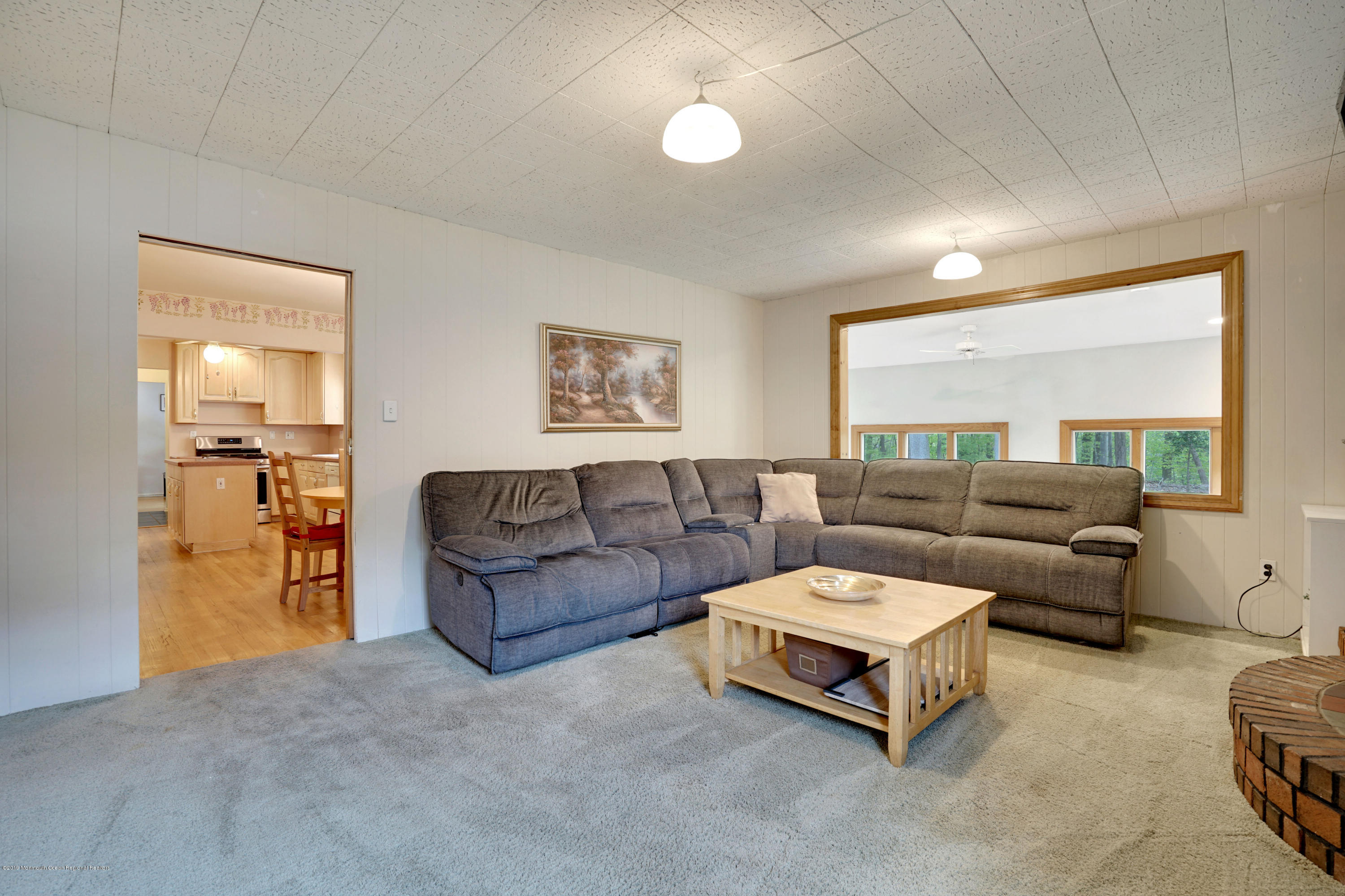 26 Marc Drive Matawan, NJ 07747 - Photo 13 of 30 a living room with furniture and a large window
