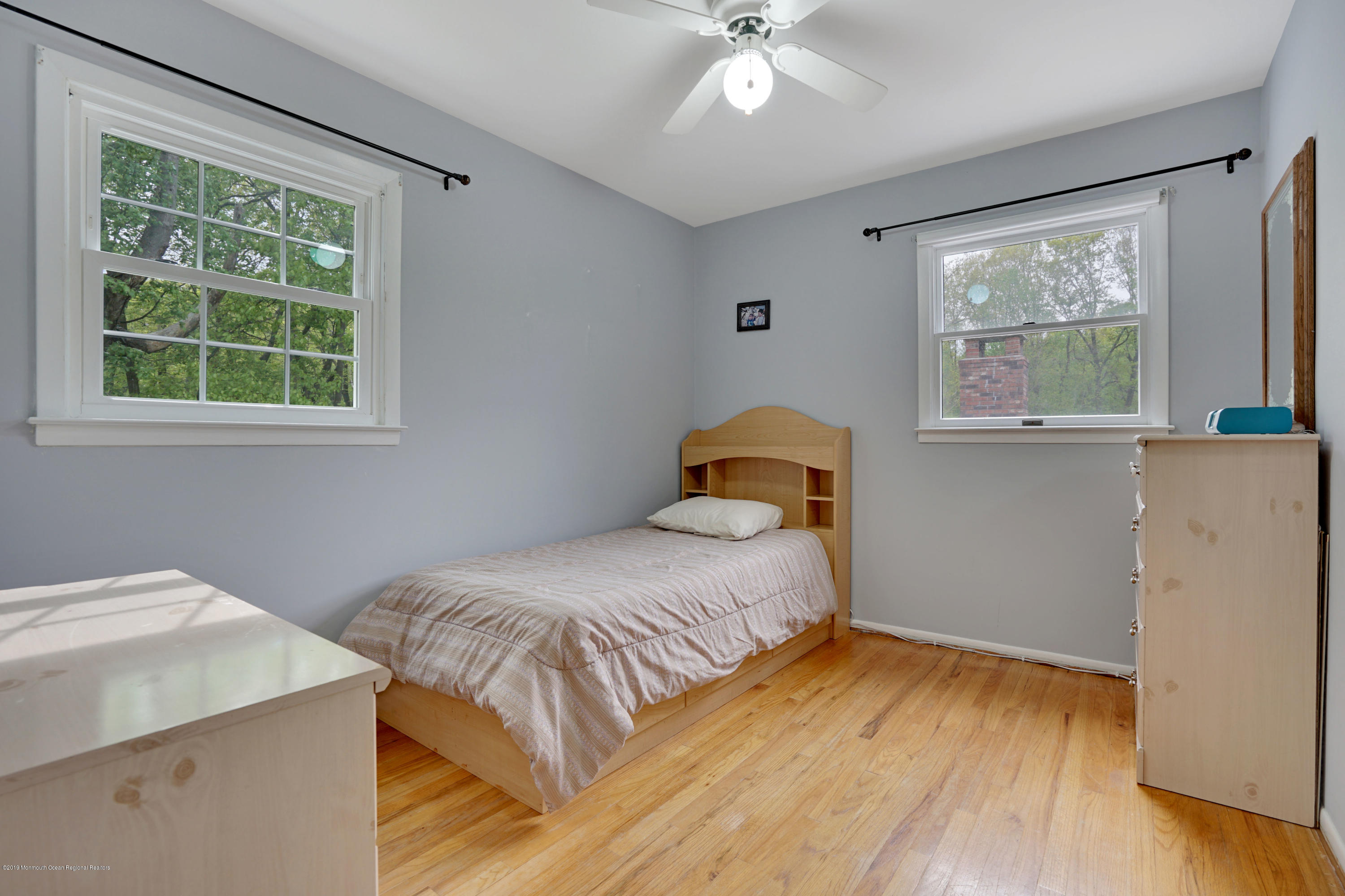 26 Marc Drive Matawan, NJ 07747 - Photo 20 of 30 a bedroom with a bed and a window